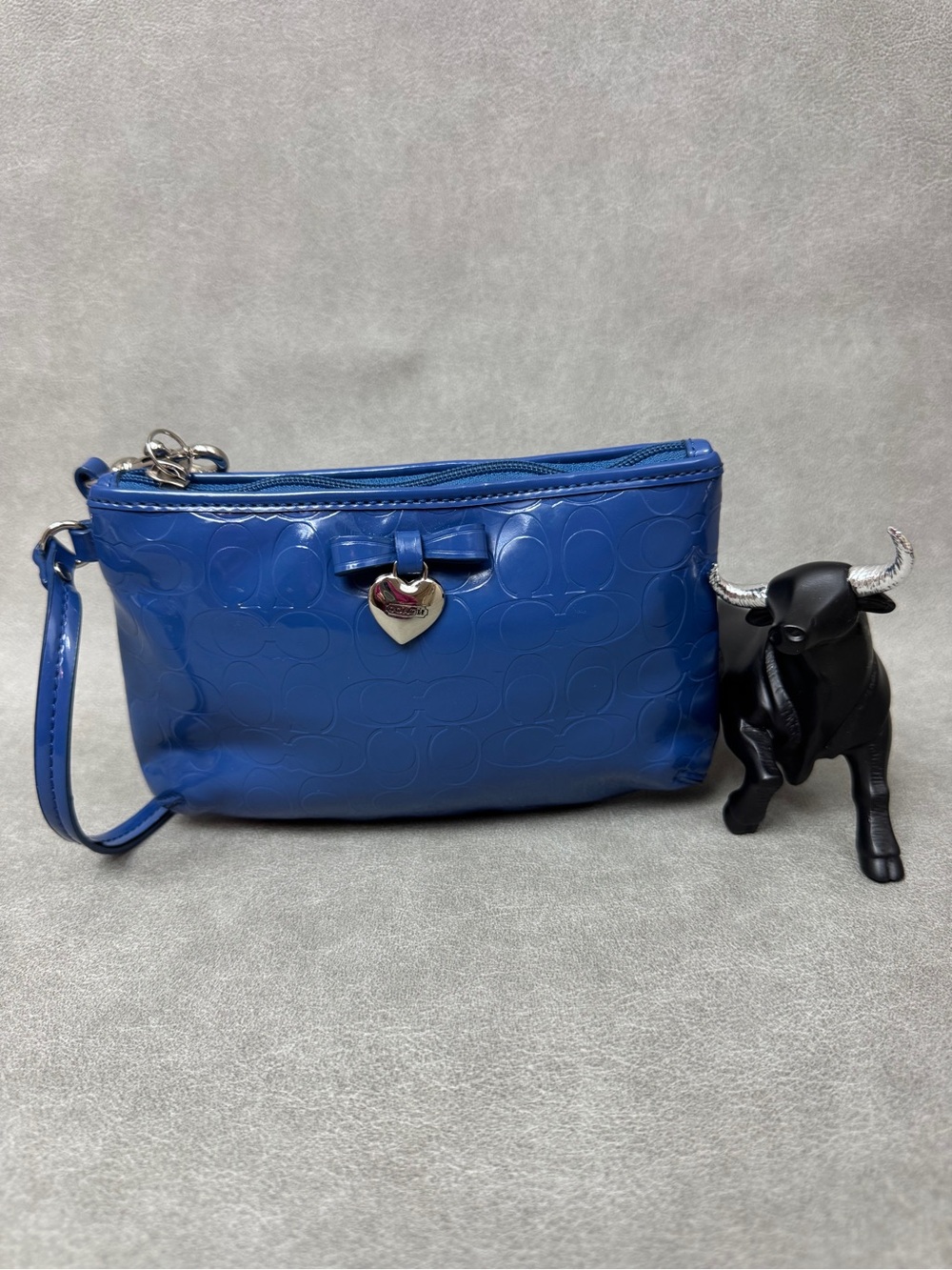 Coach Poppy blue embossed patent leather wristlet